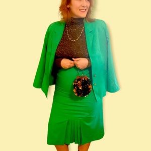 Vintage Pykettes size 12 solid green skirt suit set with blazer.